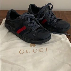 Gucci tennis shoes.